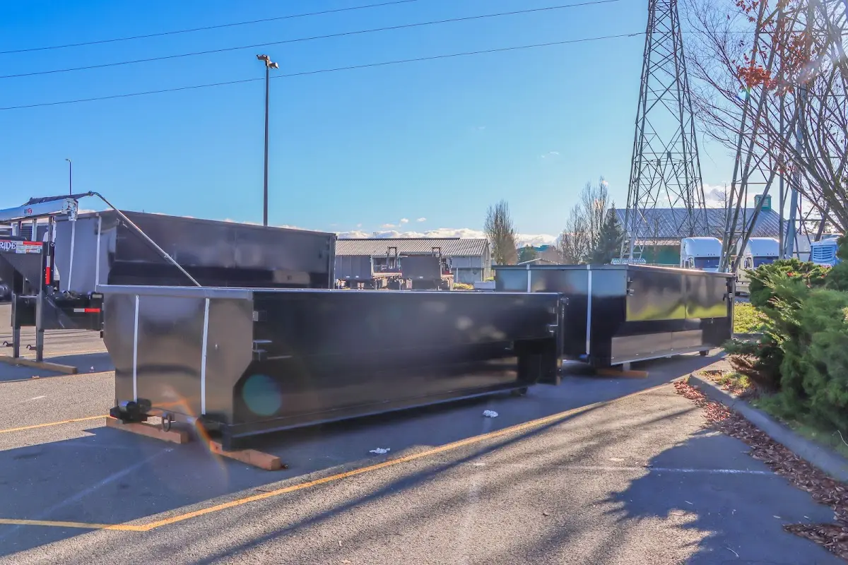 Roll-off dumpster ready for waste disposal at job site for Construction Dumpster Rental in Floral Park